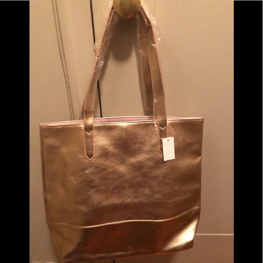 NWT large Bloomingdale’s lined rose gold tote bag